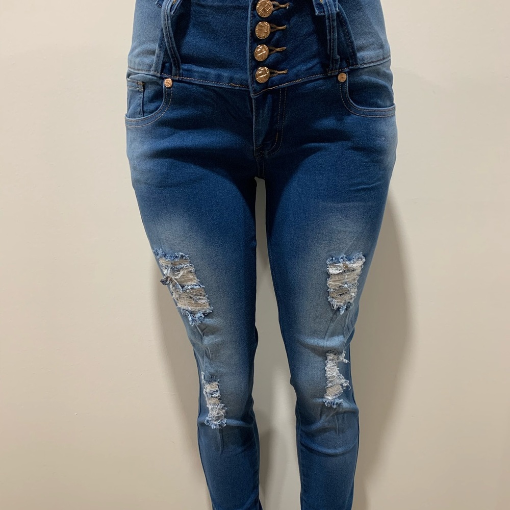 new fade blue rip Colombian designed skinny jeans